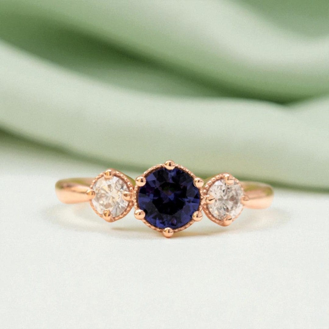 blue-sapphire-diamond-trilogy-engagement-ring-rose-gold