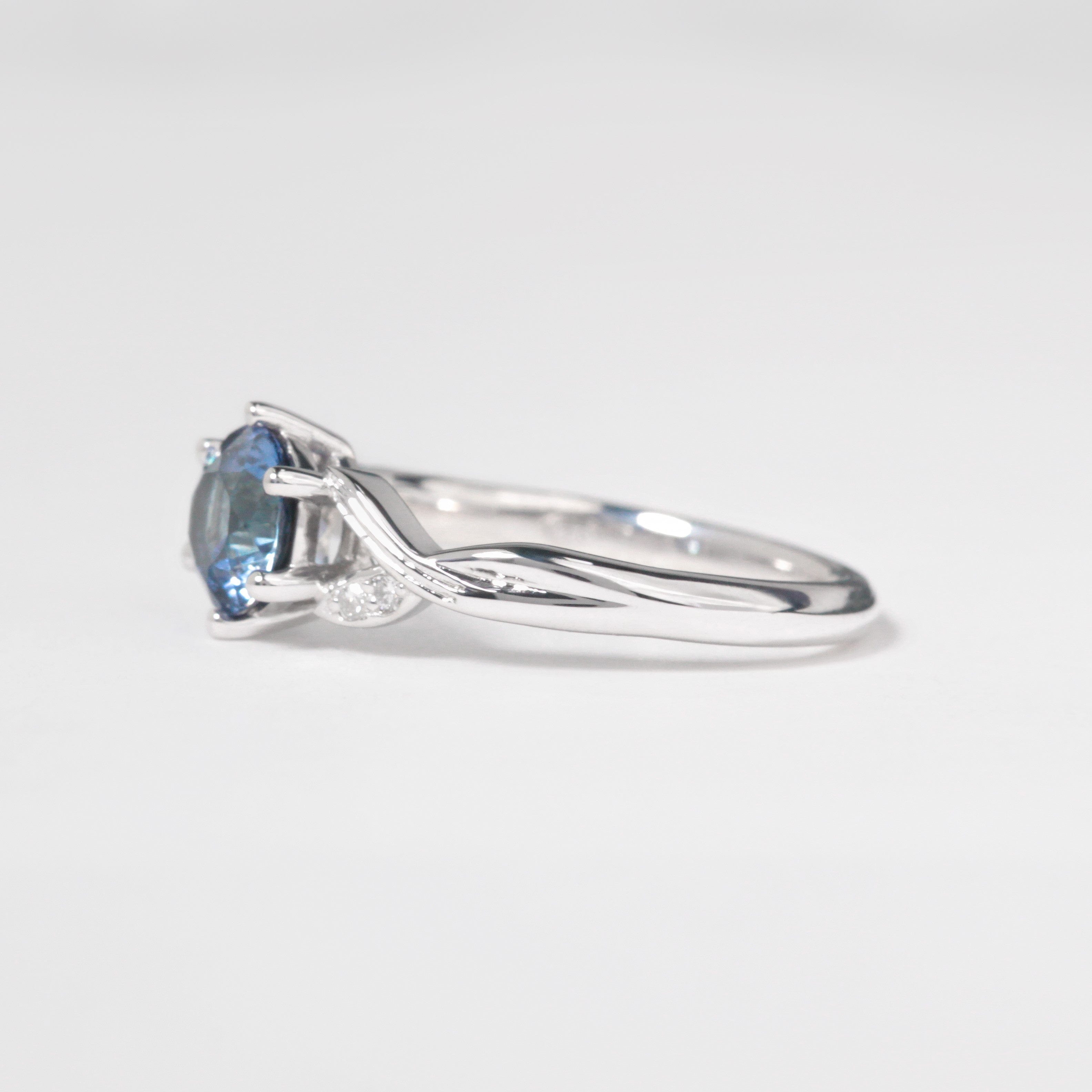 blue sapphire twig engagement ring with diamonds white gold