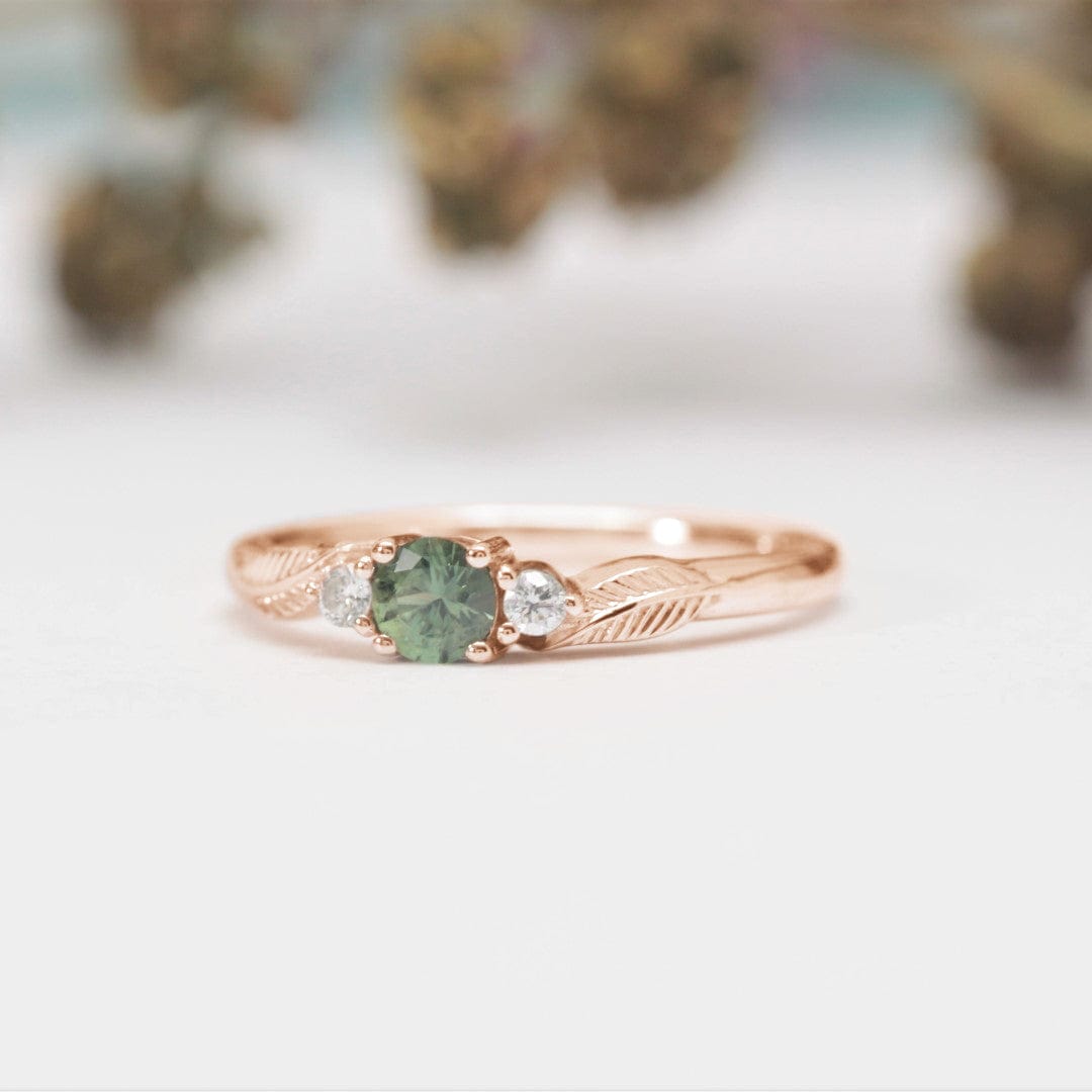 green sapphire and diamond leaf engagement ring rose gold
