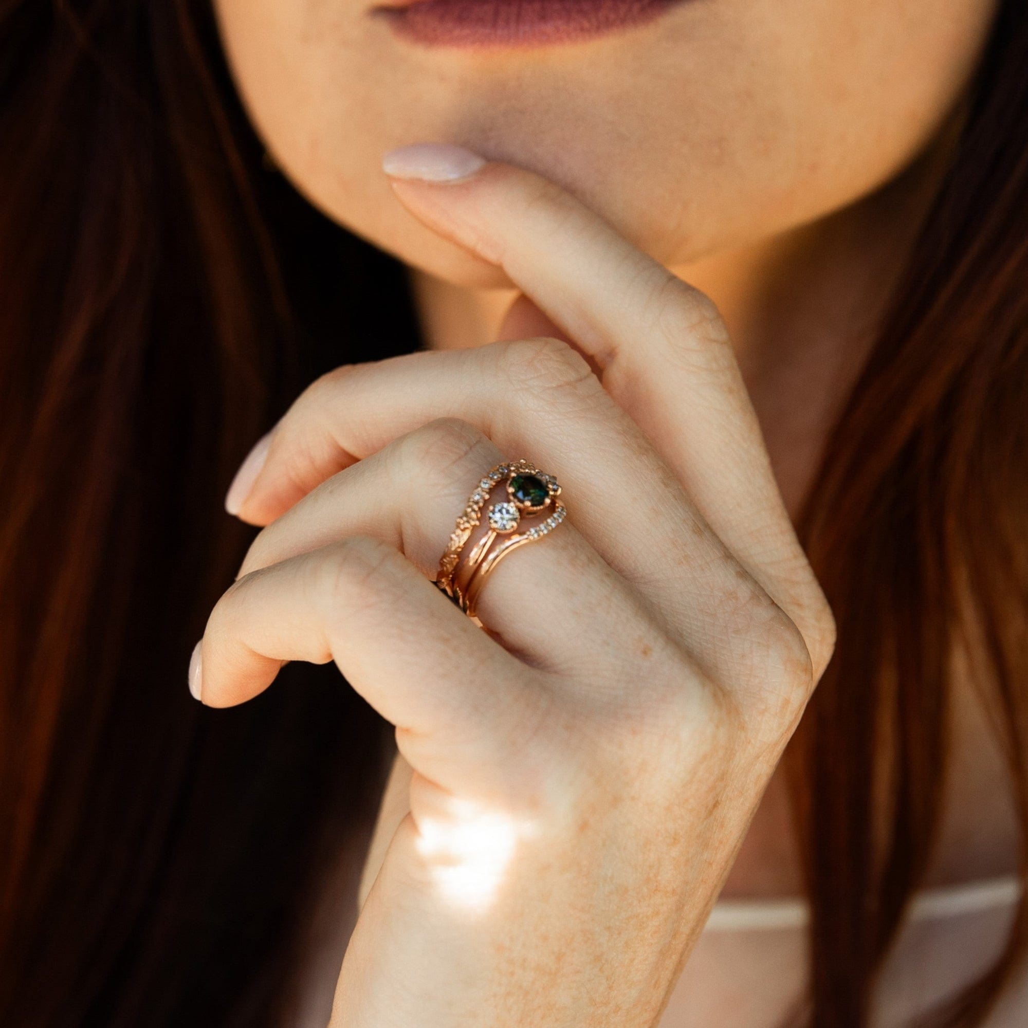 green sapphire diamond engagement ring with rose gold diamond wedding bands