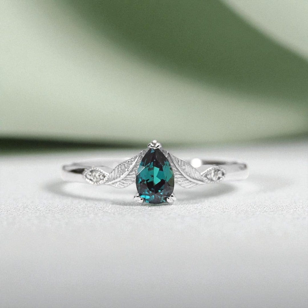 pear-alexandrite-and-diamond-leaf-engagement-ring-rose-gold-Photoroom