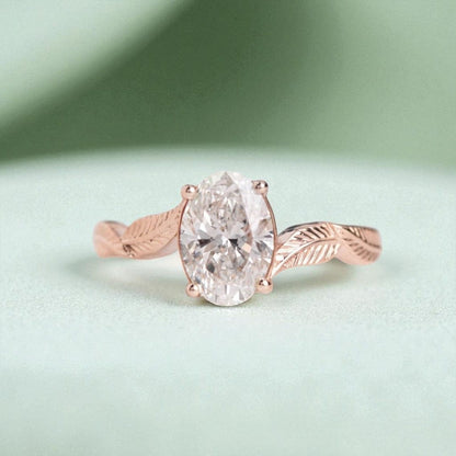 oval-diamond-leaf-engagement-ring-rose-gold