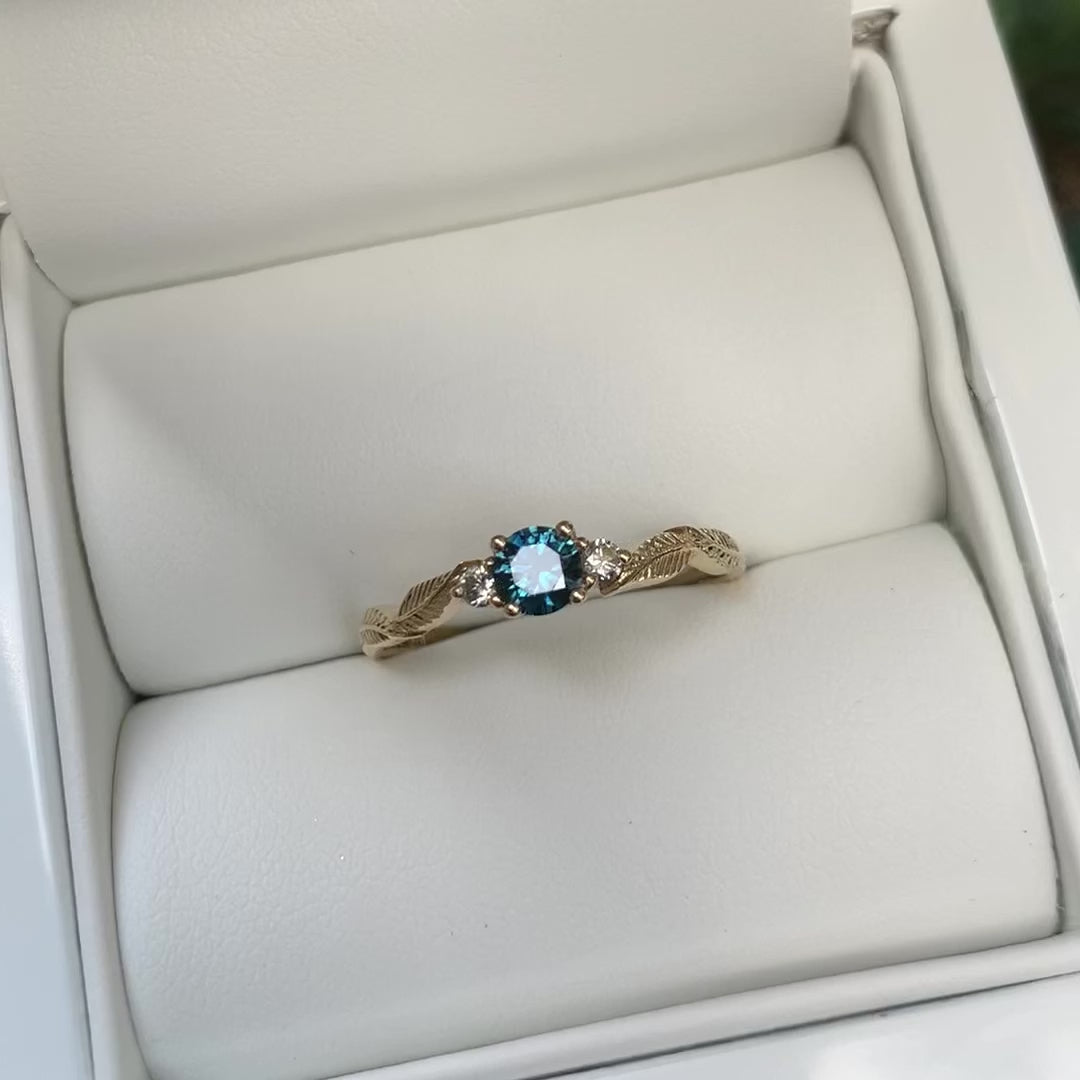 teal sapphire engagement ring 