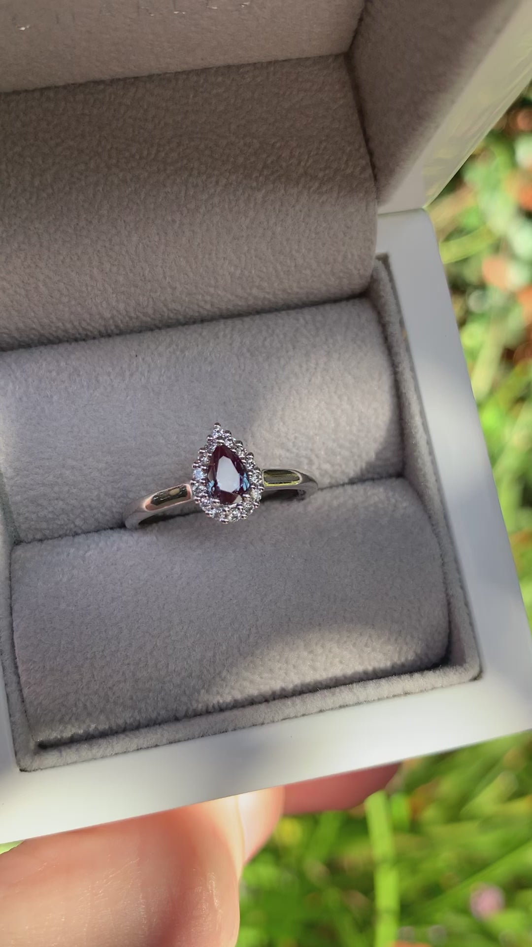 pear-cut-alexandrite-diamond-halo-engagement-ring