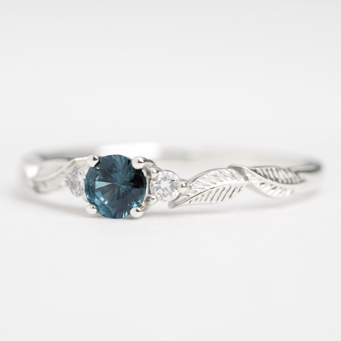 teal sapphire diamond leaf engagement ring white gold square