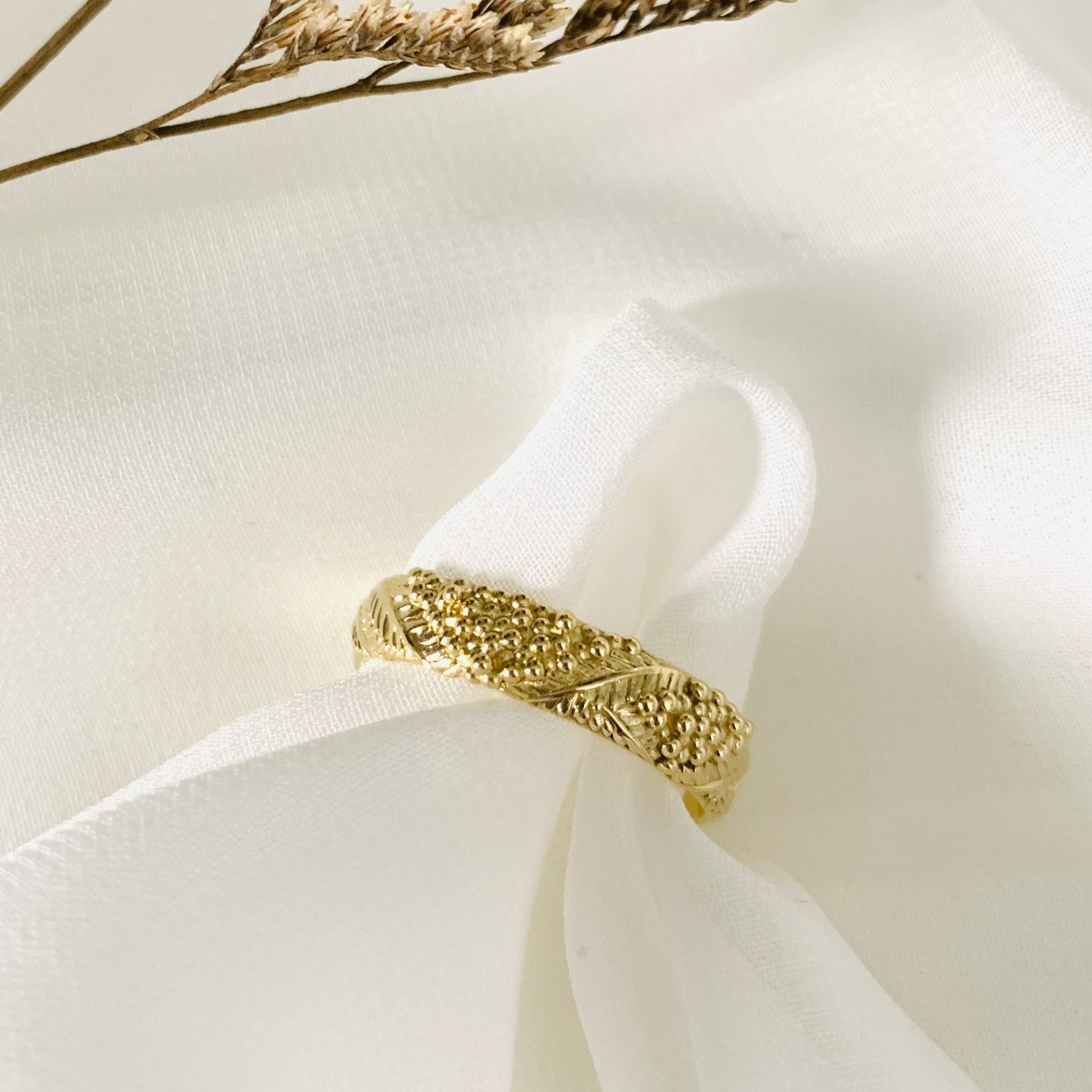 wide wattle leaf wedding band yellow gold